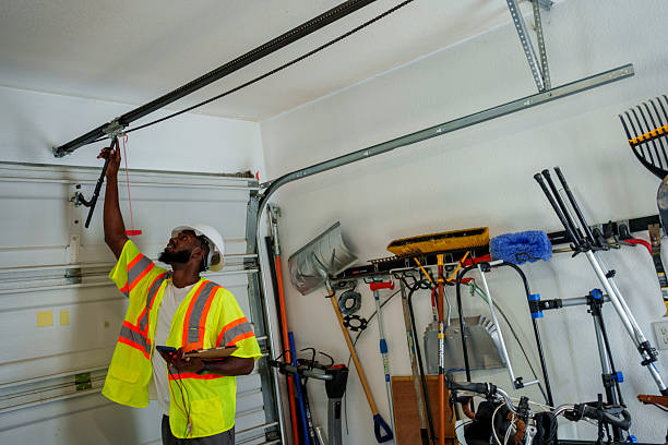 Professional Garage Door Roller Replacement technician working in Park River, ND